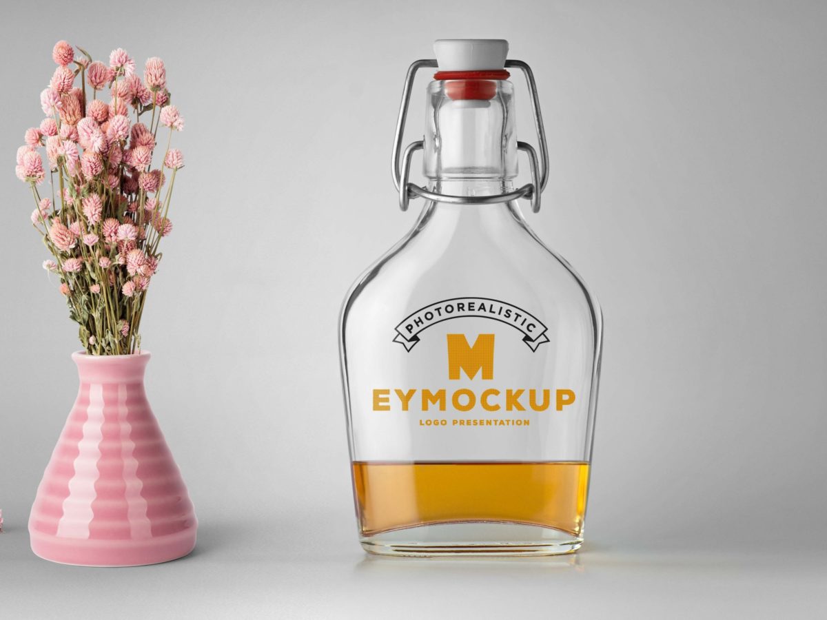 Realistic Flower Oil Bottle Mockup 1 New Hair Oil Bathroom Bottle Label Mockup 1200x900 1